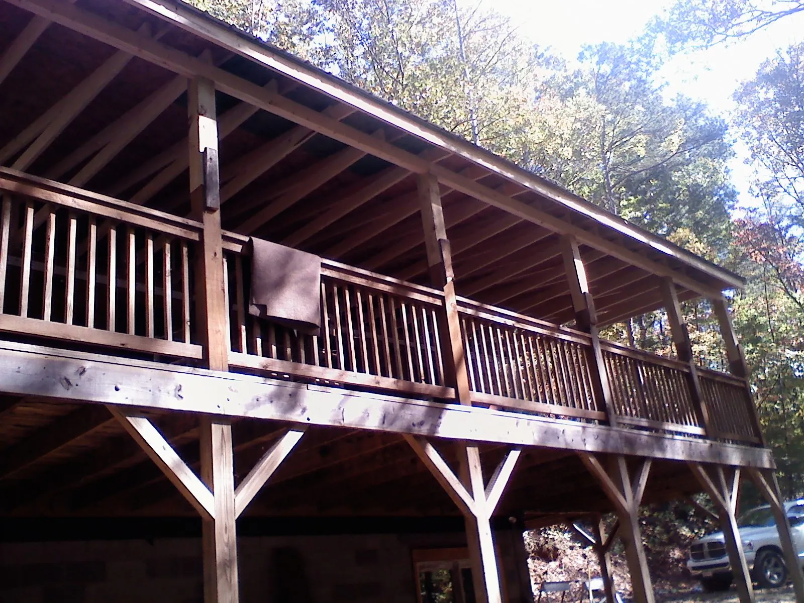 Timber framing under a new elevated porch and deck — Roof Leak Repair in Newcomerstown by Roofing Brothers